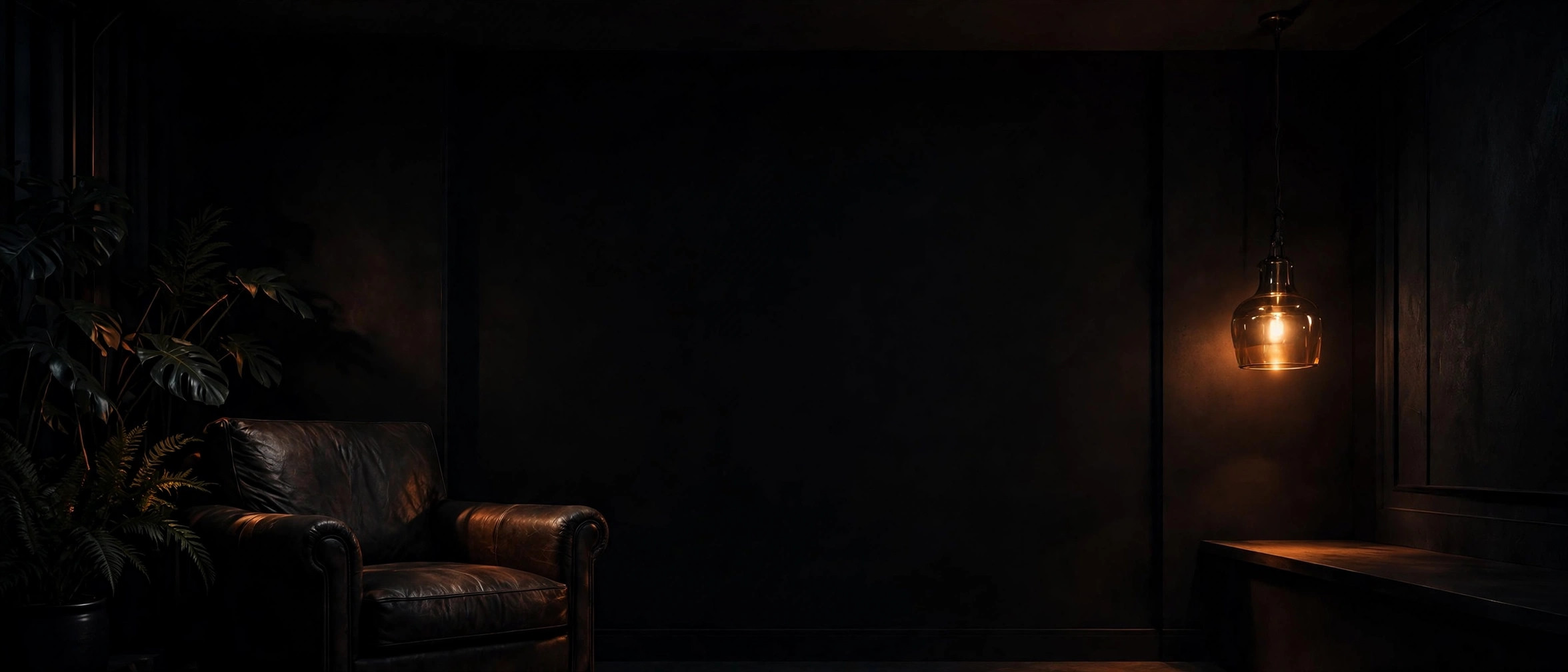 Dark moody luxury interior with warm amber lighting